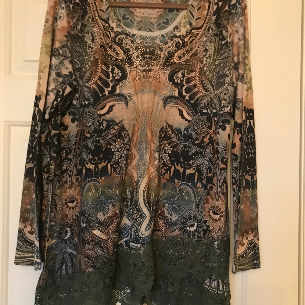 One World Tunic with lace hem. Green, blue, tan and ivory smocked slightly.